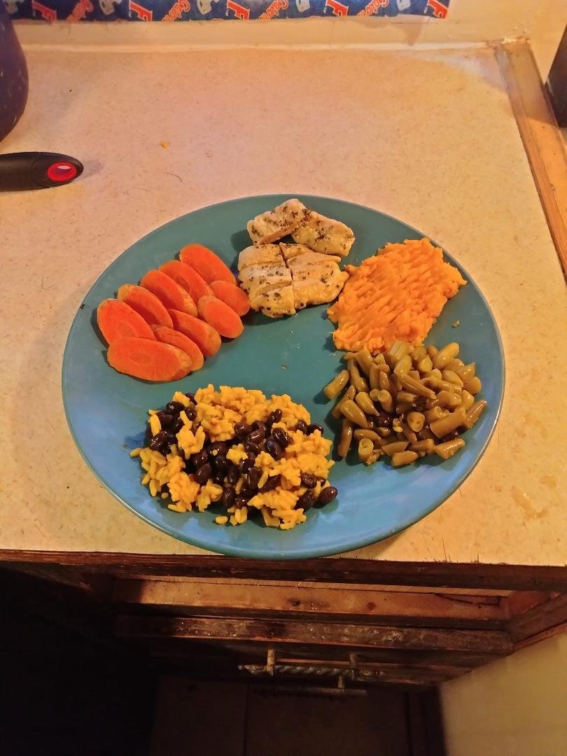 I am not a blogger not sure what to put on my page so I'm putting a picture of one of my favorite meals green beans fresh sweet potatoes boneless skinless chicken thighs with fresh basil and garlic powder steamed carrots an