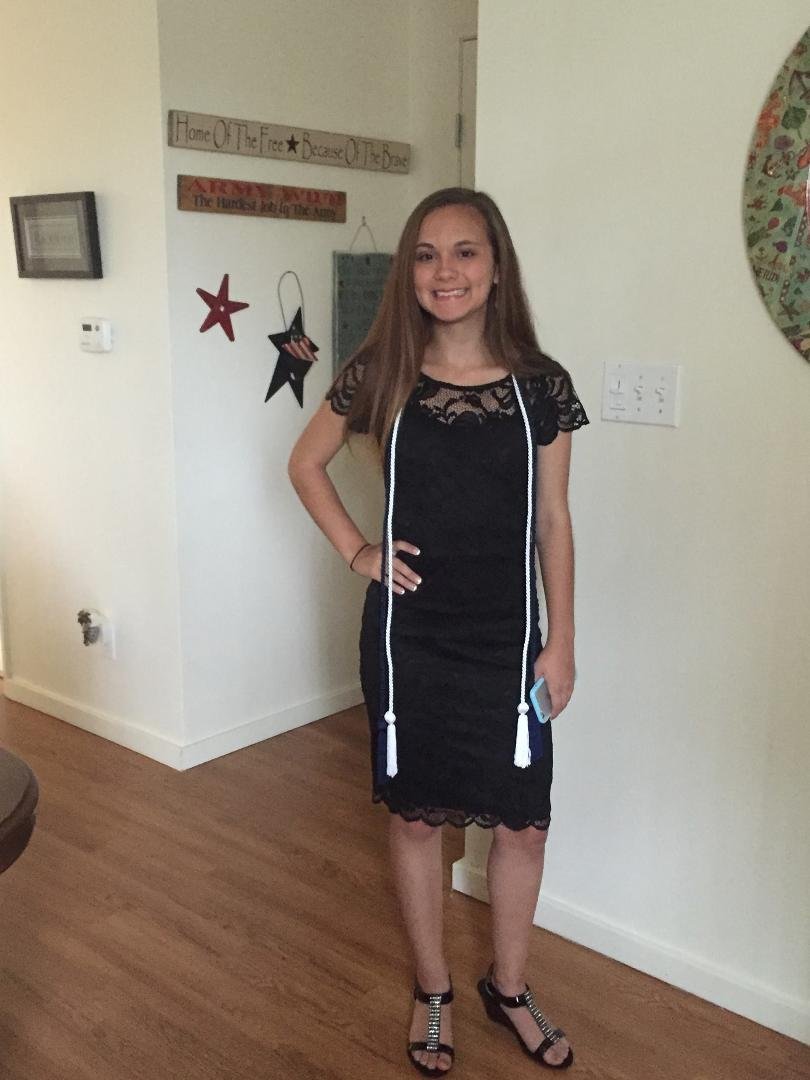 Granddaughter Katie Cannon 8th grade graduation. Growing up too fast.
