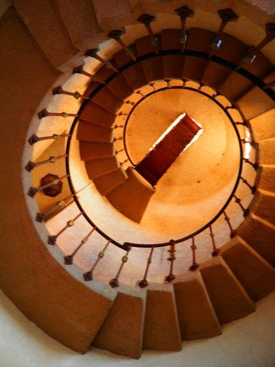 The circular staircase in the tower. Just for coming and going. Neither he nor she nor any of their friends were ever confined here.
