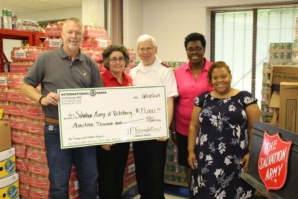 International Paper Foundation presents a check that will go a long way in helping us provide nutritional food for our neighbors in need.