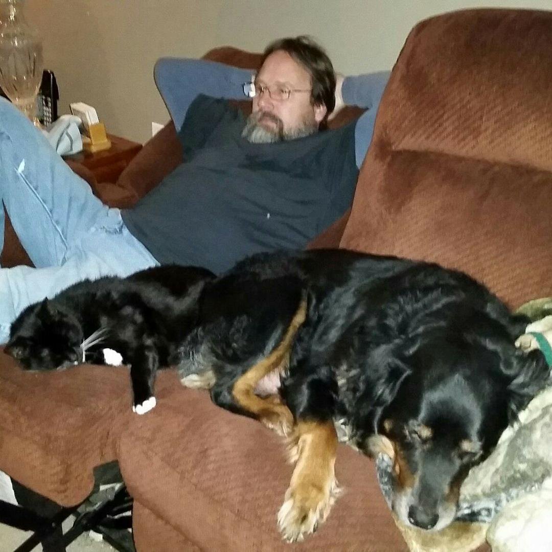 Billy and 2 of our four legged babies relaxing
