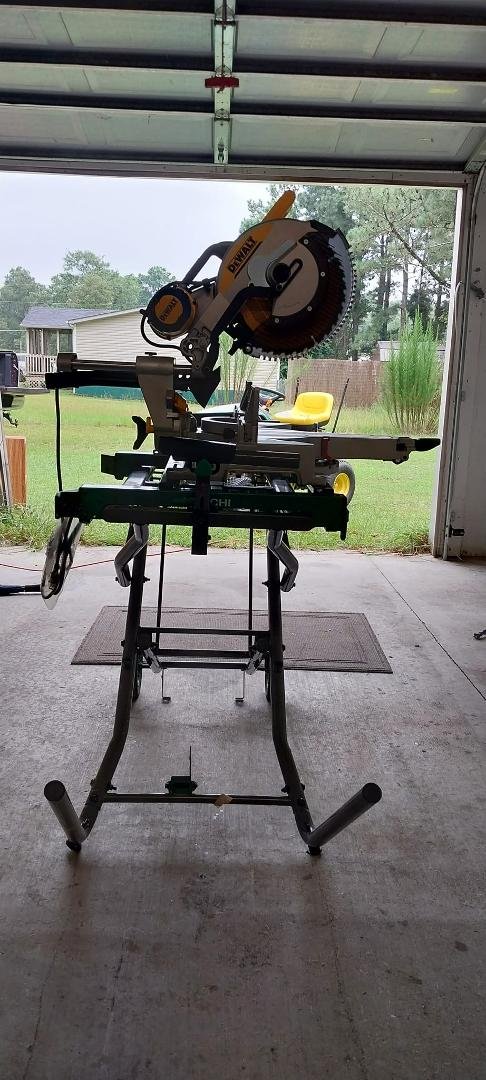 Finished clearing out the garage and got my new saw mounted. Now to make a stationary miter station for it and a rolling outfeed table and mount my table saw to it. Didn't I retire?. I'm whooped. Time for a shower and forag