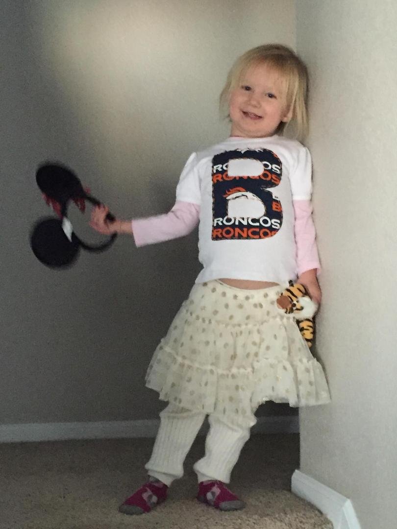 Chloe is ready for football Sunday with Brincos Mom Nd Seahawks Dad!
