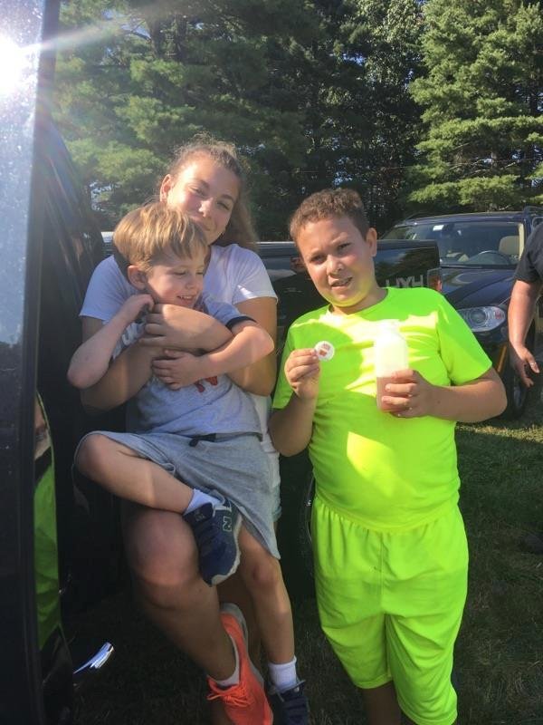 Jacob  had so much fun apple picking with his sister and brother