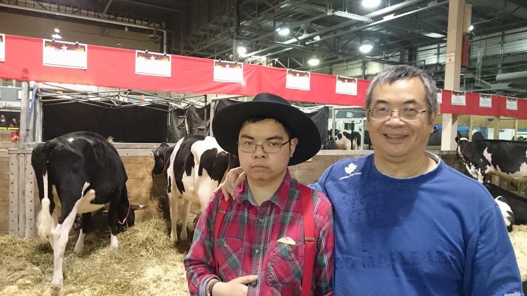 Sean and I up close with the cows at the 95th Royal Agricultural Winter Fair