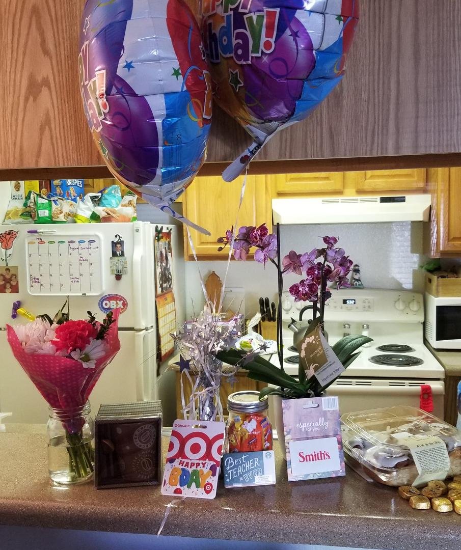 I'm so fortunate. Not only was this Teacher Appreciation Week, today was my birthday, too. Fresh flowers, an orchid, a new coffee mug, several gifts cards, a box of cinnamon rolls, many sweet notes and cards, and a first
