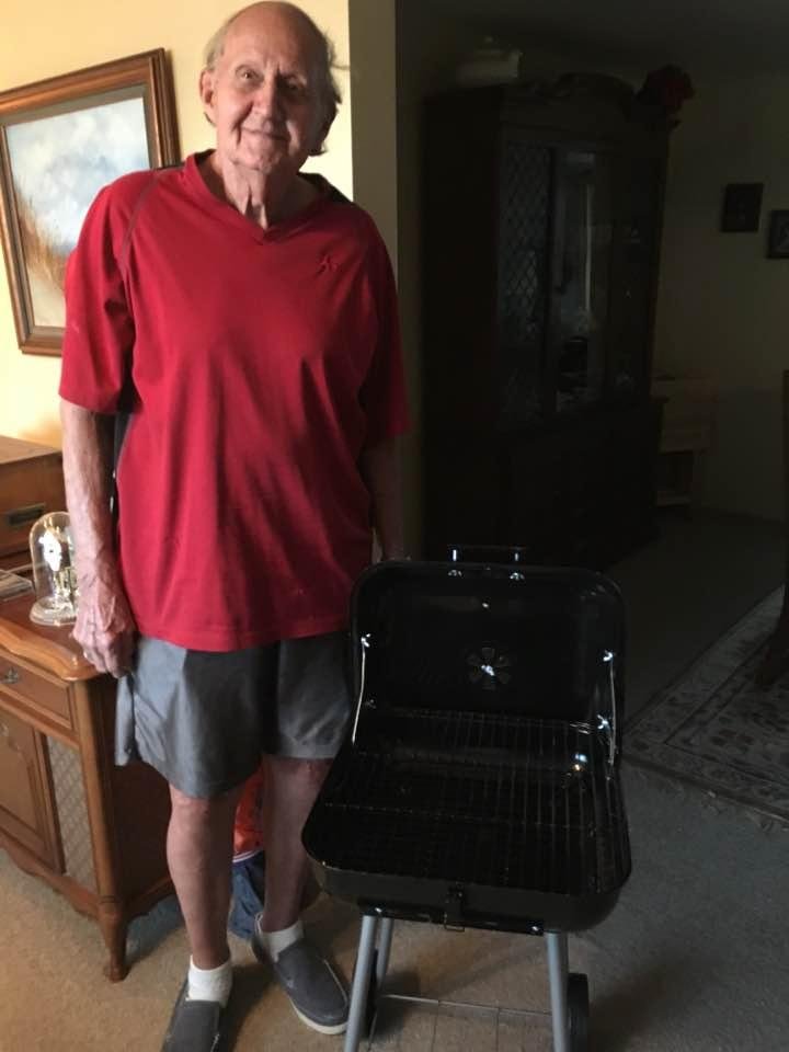 Dad & my brother putting together my $20 grill LOL thousand parts now we know why it was $20 I love it though and I love them for helping me