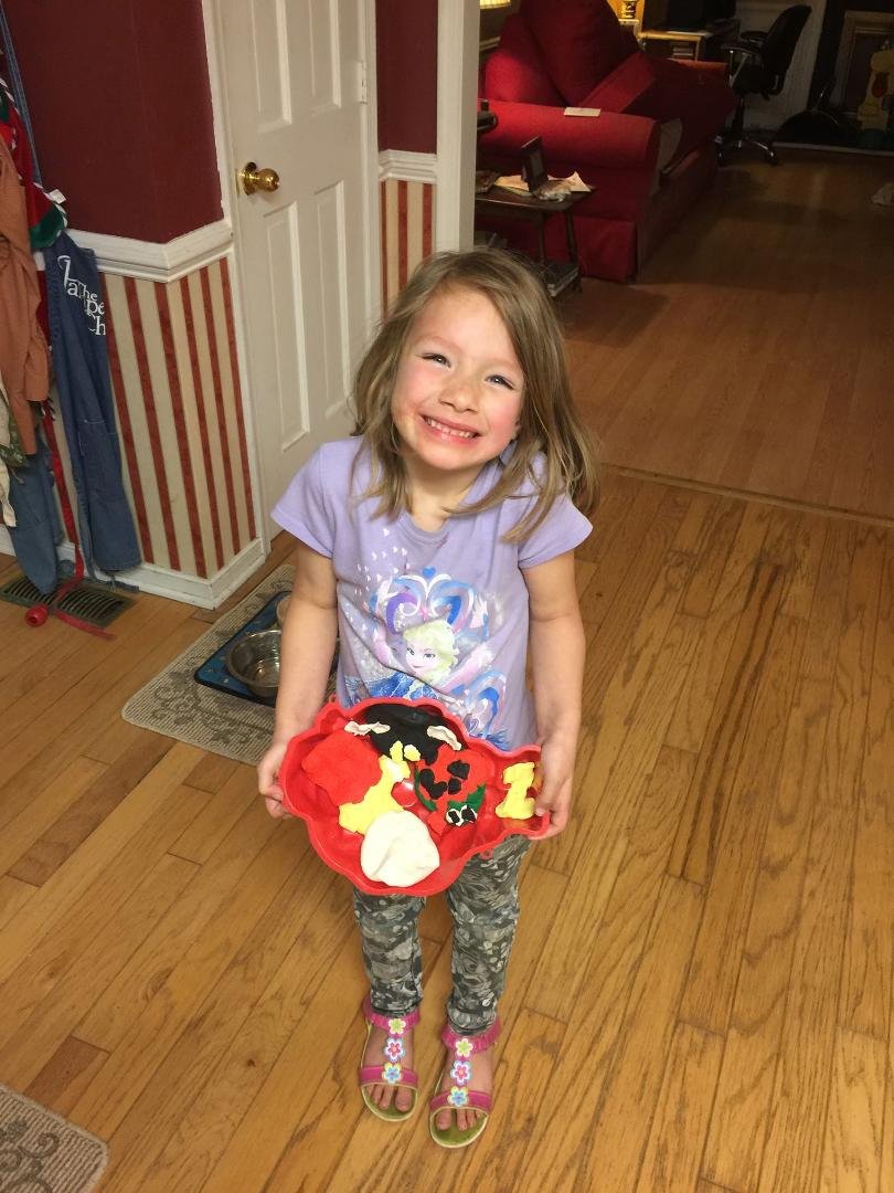 Ellie with her new box of 20 different colors of playdoh, when I was growing up we had 3 boring colors. Kids have it made today don't they !