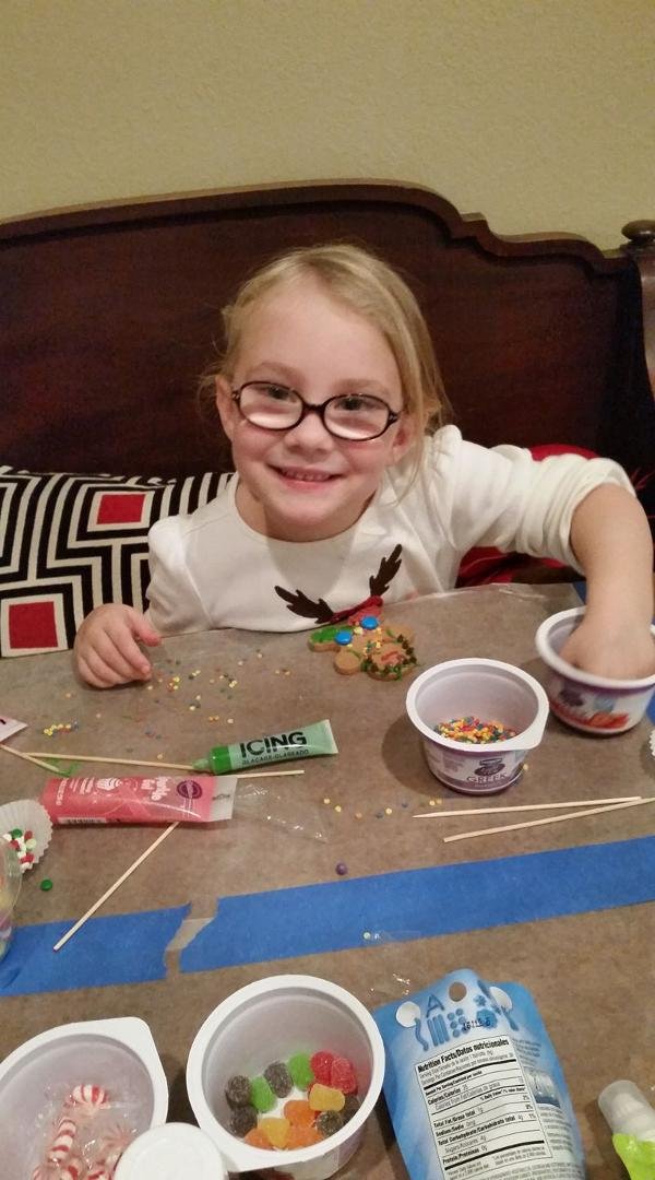 Sweet Emily, our nieghbor, came to decorate gingerbread men last night. We had so much fun together.