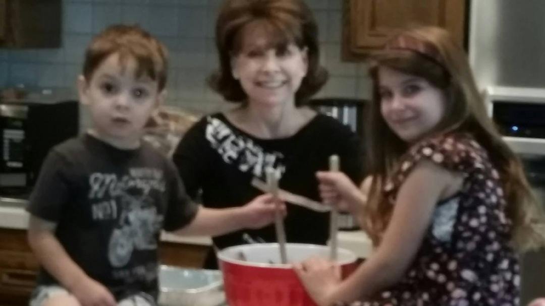 Grandma and Sienna and Morgan baking brownies. Fun day! Xo