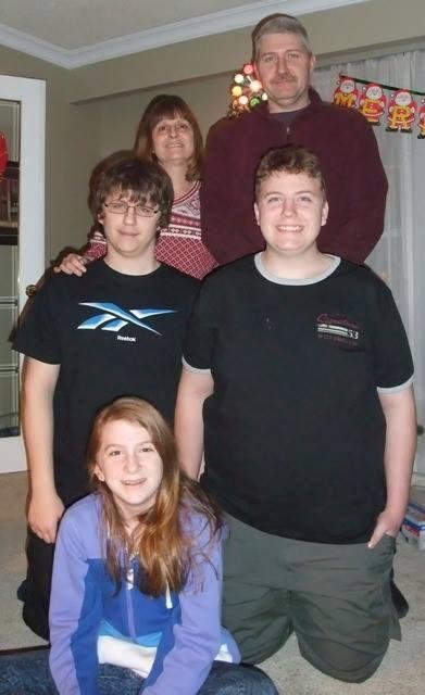Our grandsons are on their knees and Mom can hardly be seen. What a wonderful way to start the New Year.