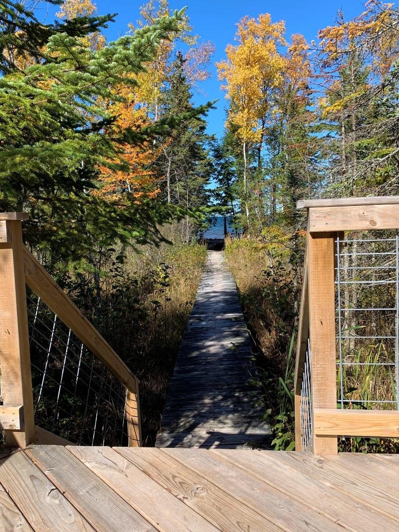 Back at the cabin.... out on the deck, enjoying the sun, wonderful temperatures, and the sound of the Lake Superior shoreline