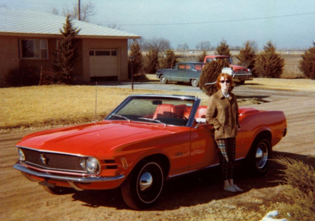 1970 Mustang, color Calypso Coral. Those were the days! Taken January 1970. And yes, that is me. Was talking about this car to a friend.