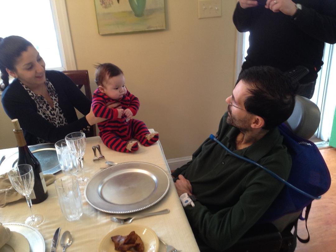 Uncle Eddie and Nephew Alton Wittman 'converse' before Easter dinner.