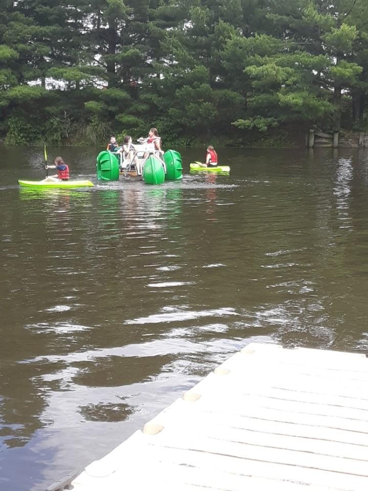 Kayaks buzzing the trike.
