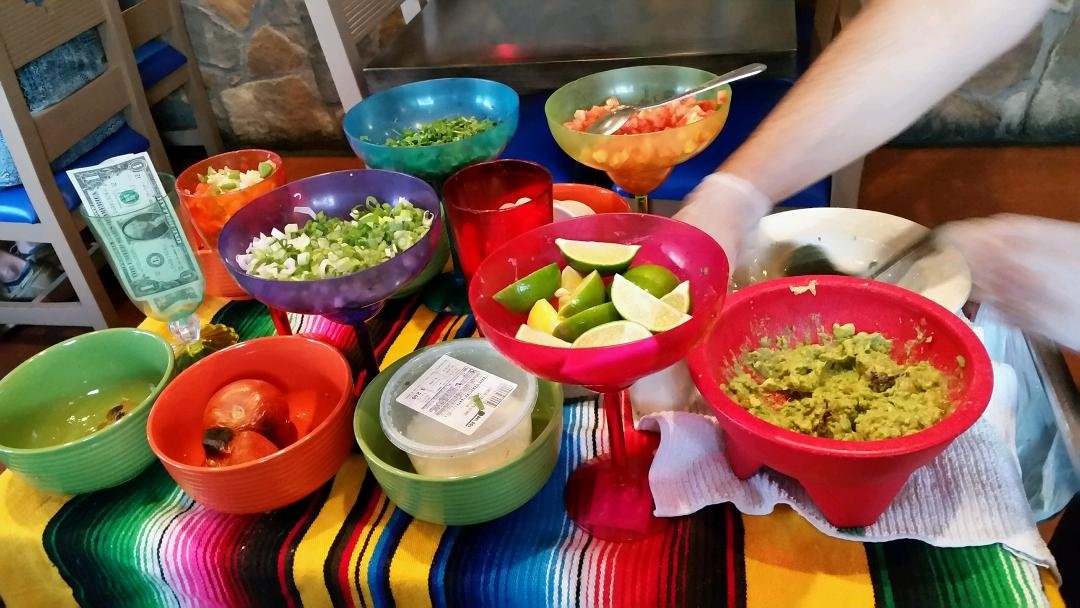 Having dinner with Sonia and Annmarie Barajas tableside guacamolie to start