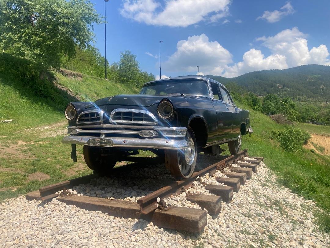 55 Chrysler New Yorker rigged to run on train tracks, Uzice, Serbia.
Special undercarriage with railway wheels.
Why was I surprised to see it had no steering wheel?