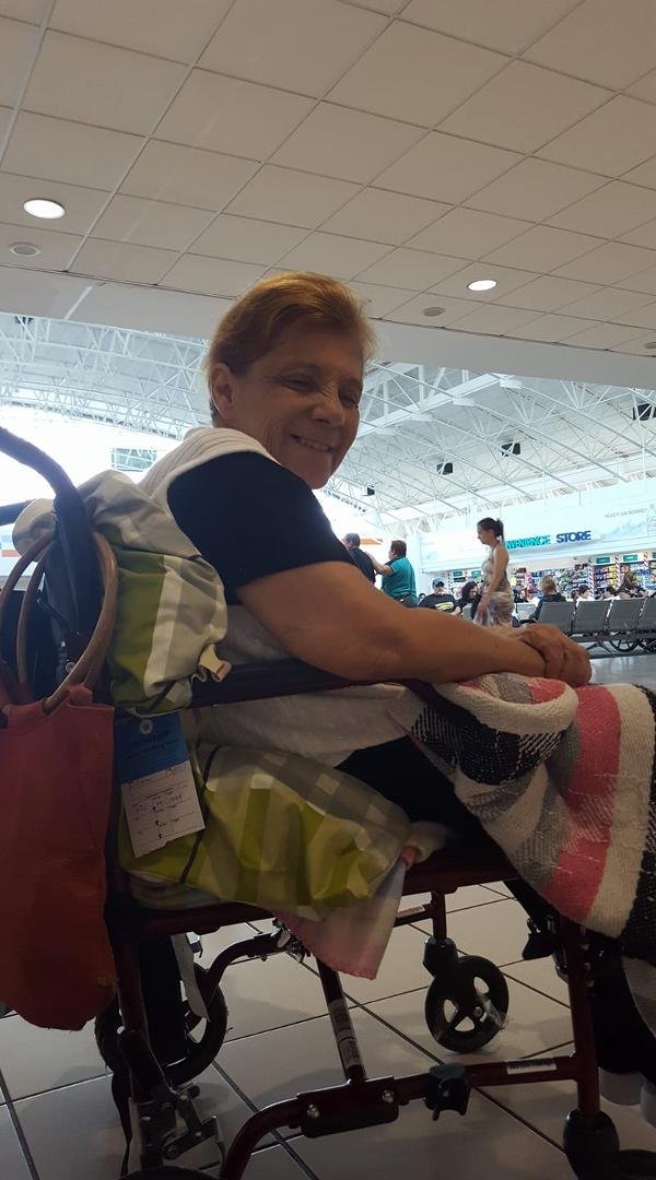 At the airport,boarding soon. Mom is pushing thru...almost home!!!!