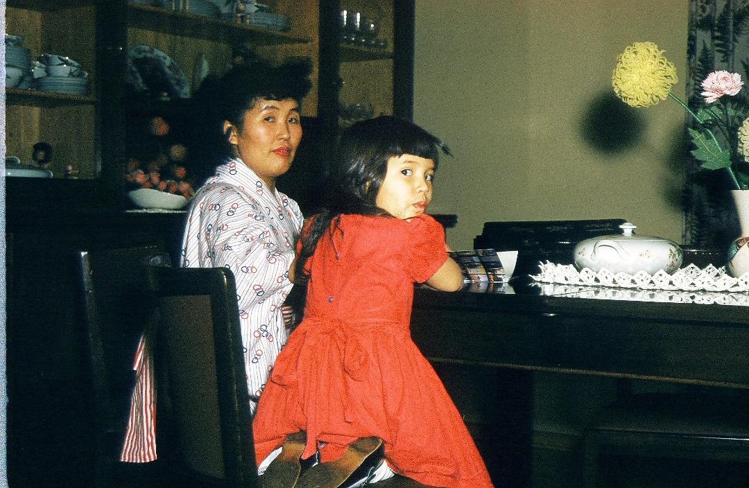 my mom & me, I was around 4yrs old prolly taken in Germany. I miss her so much !!