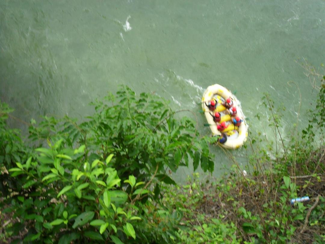 Looking down at the rafters travelling downstream of Cagayan de Oro River from the exit side of Makahambas Cave.