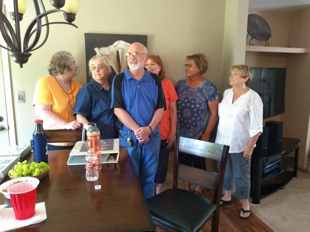 Cousins doing our grandfather's pose