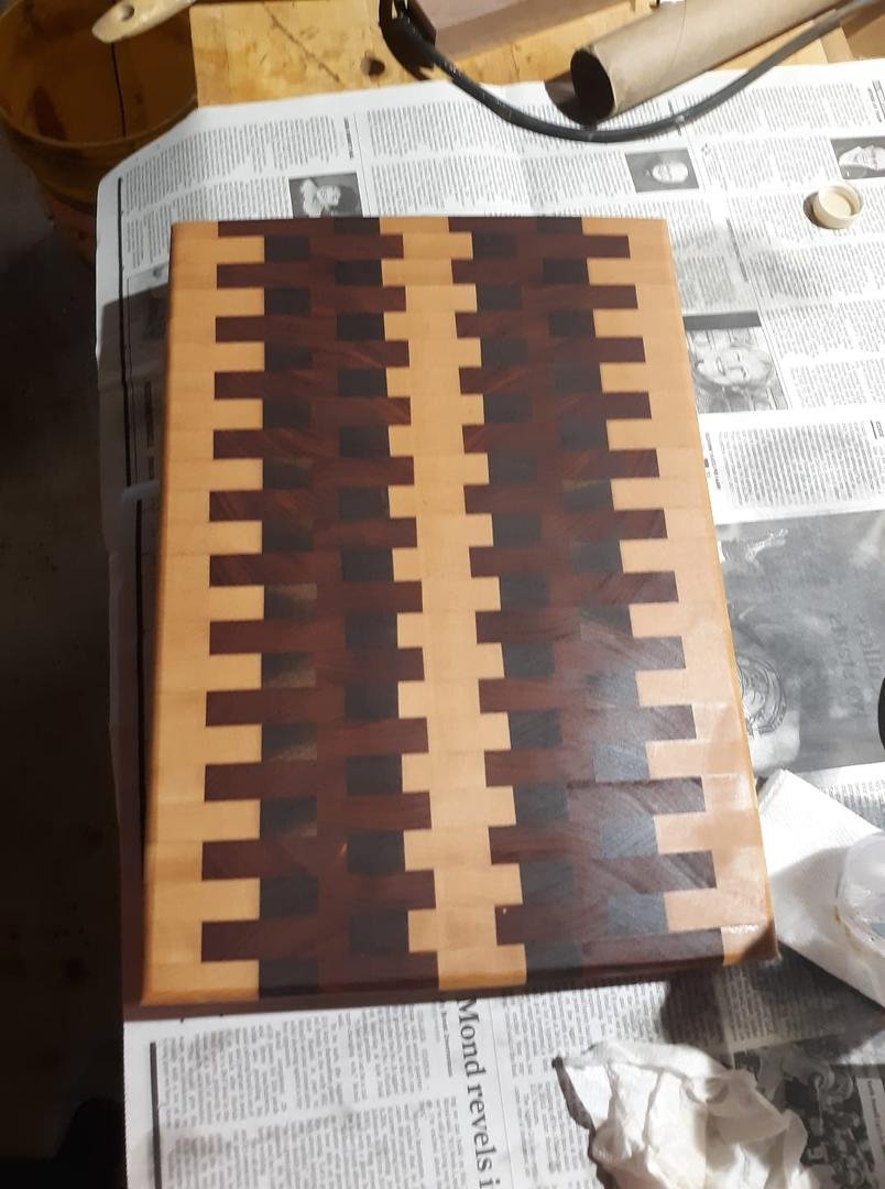 This is my first serious attempt at making an end grain cutting board. It turned out pretty well and I am giving it an 8 out of 10 on my Stollometer. Still not perfect but a keeper. Barb said it is too nice to use but ma