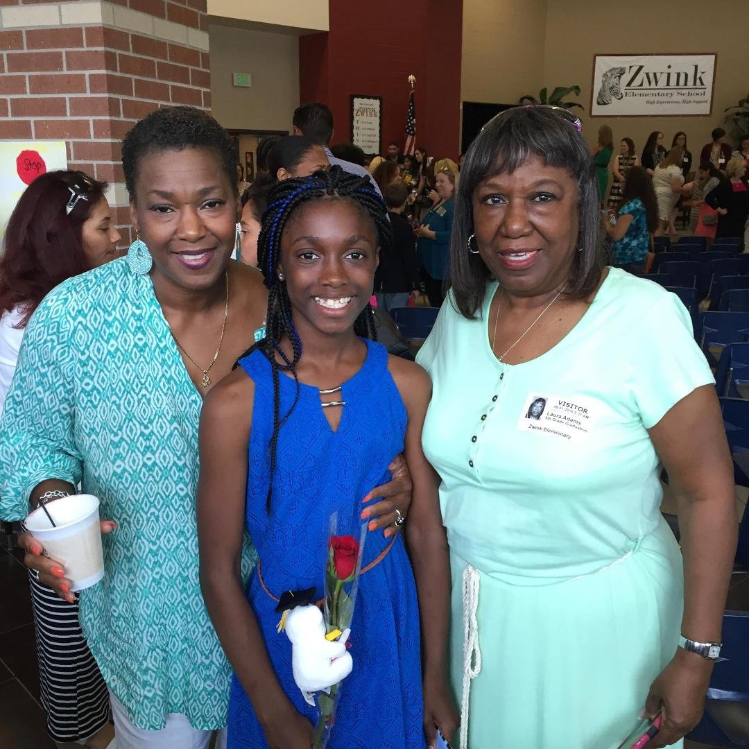 Celebrating niece Kaiya Adams  promotion ceremony.