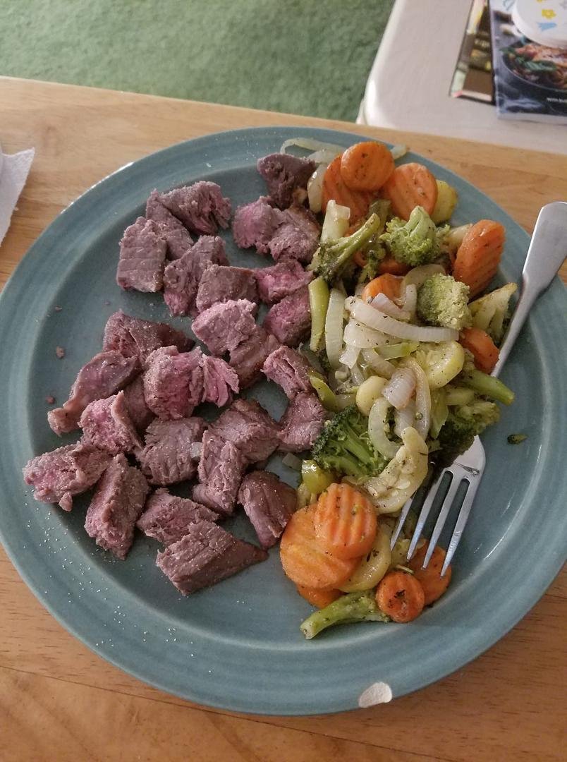 Trying to eat better to improve our health. Doing basically a keto diet, although there are just some things I won't switch out. Tonight, steak with sauteed veggies: carrots, green peppers, onions, broccoli, yellow squash.