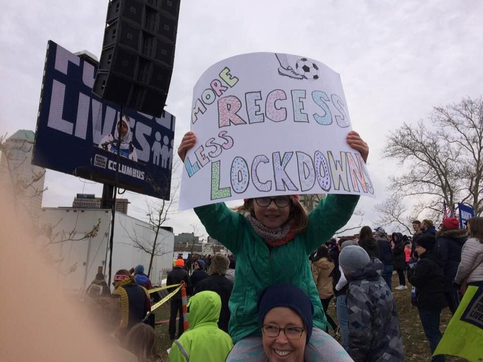 Loved the sign and her smile.