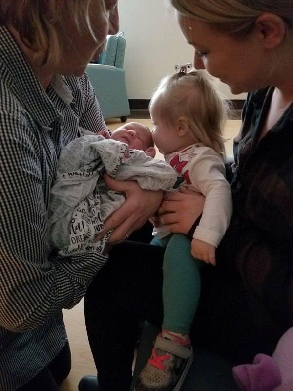 this is my first grand daughter Cami meeting her new baby sister Chloe