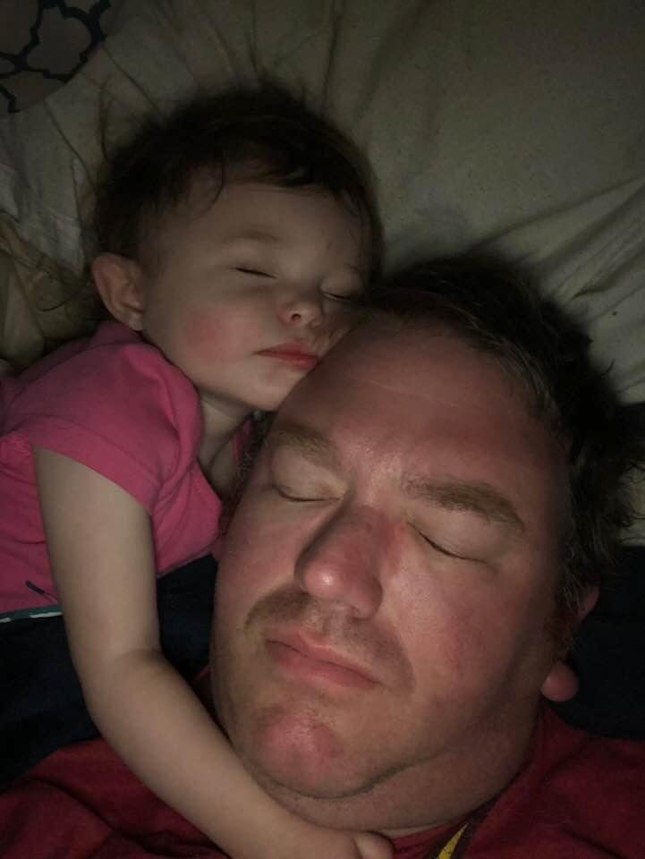 This is what I wake up to every day. She loves her Poppy even in her sleep.