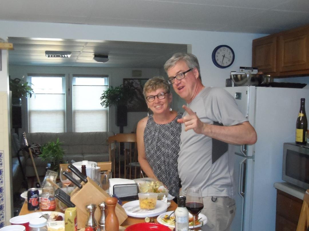 Chuck and Gay in Chuck's kitchen not Charlies.