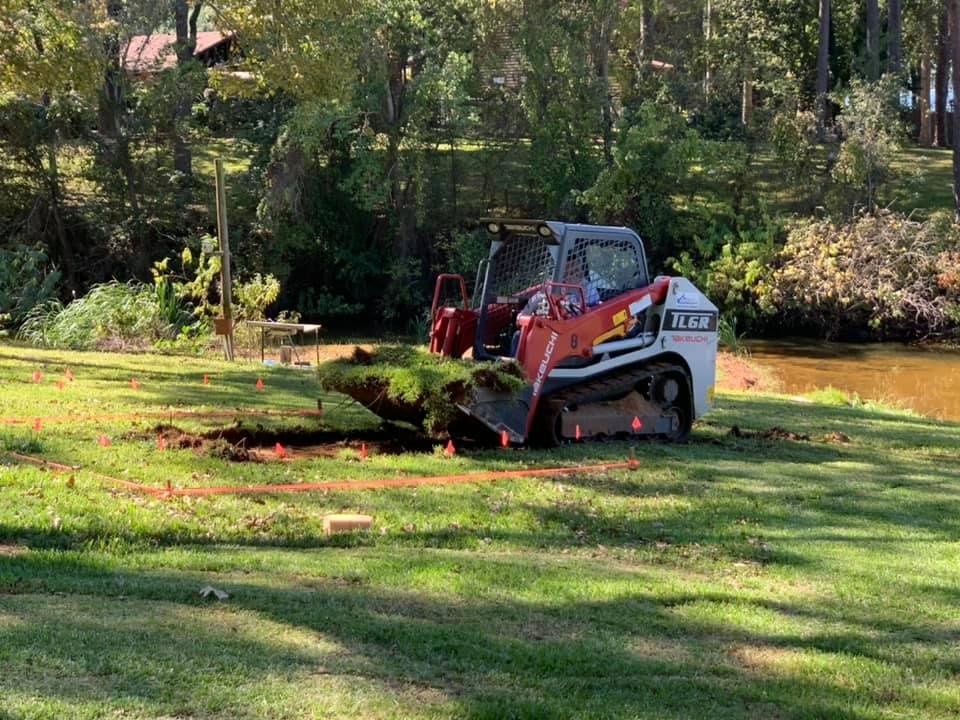 My neighbor was having some dirt work done at his house so I hired his contractor to dig out the hole in my yard to level the slope of the ground.