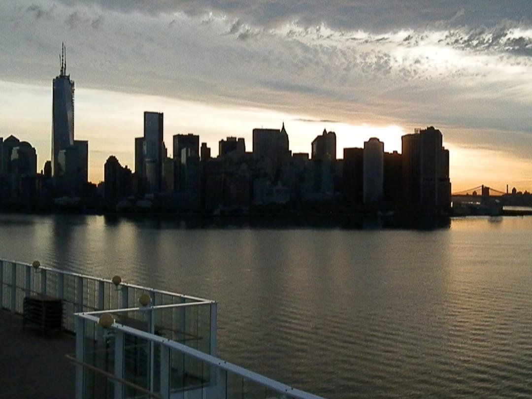 New York City skyline at dawn with Freedom Tower on the left