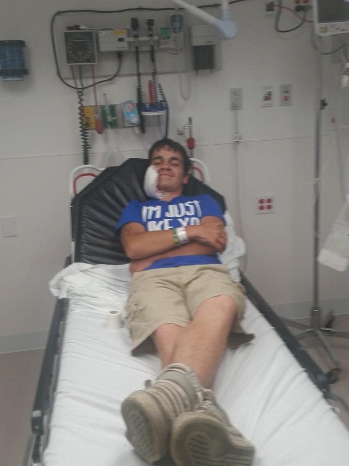 Logan waiting to be transported to Akron Children's Hospital to have plastic surgery on his face