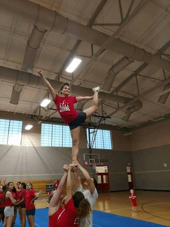 Granddaughter is a great athlete and cheerleader.