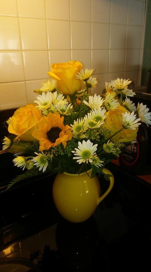 My beautiful Mother's Day flowers from my first born Cheryl "Buttons" Ratcliffe Cox. They are so pretty as well as the vase. Thank you so much. I love them.