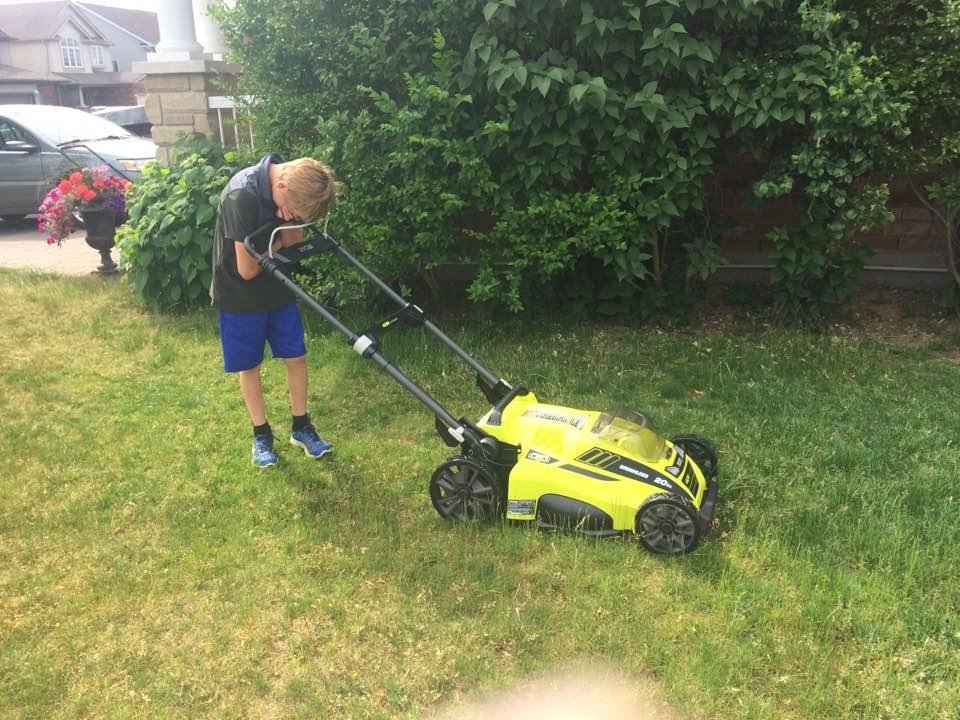 My sons first lawnmower. Look how excited he is!!!