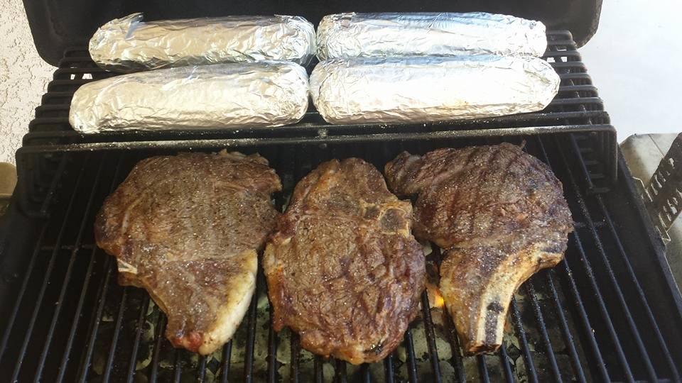 Ribeyes and corn on the cob... Tasty!... We miss you Andrea Brickey!...Wish you were here!... Hope you're having a Happy Fourth of July!... We love you!
