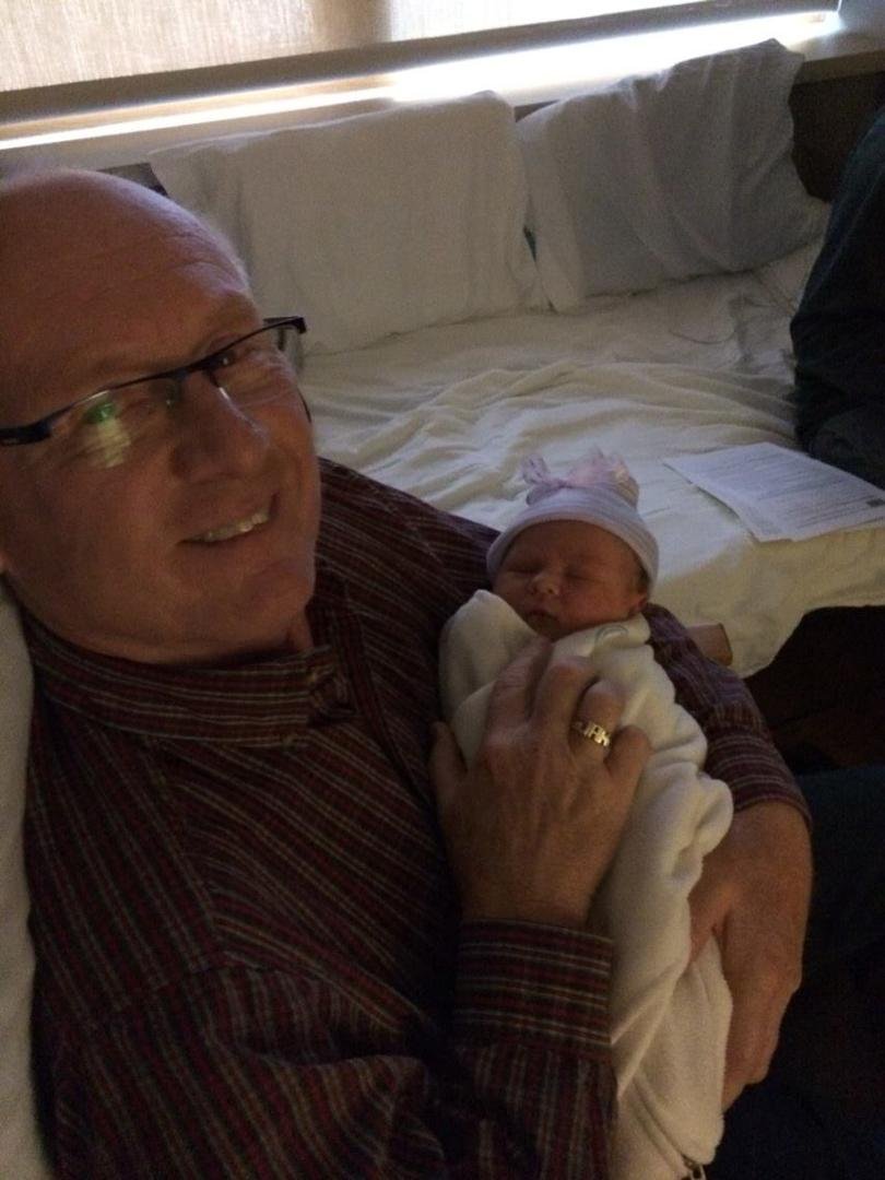 Enjoying our time with our new granddaughter.
