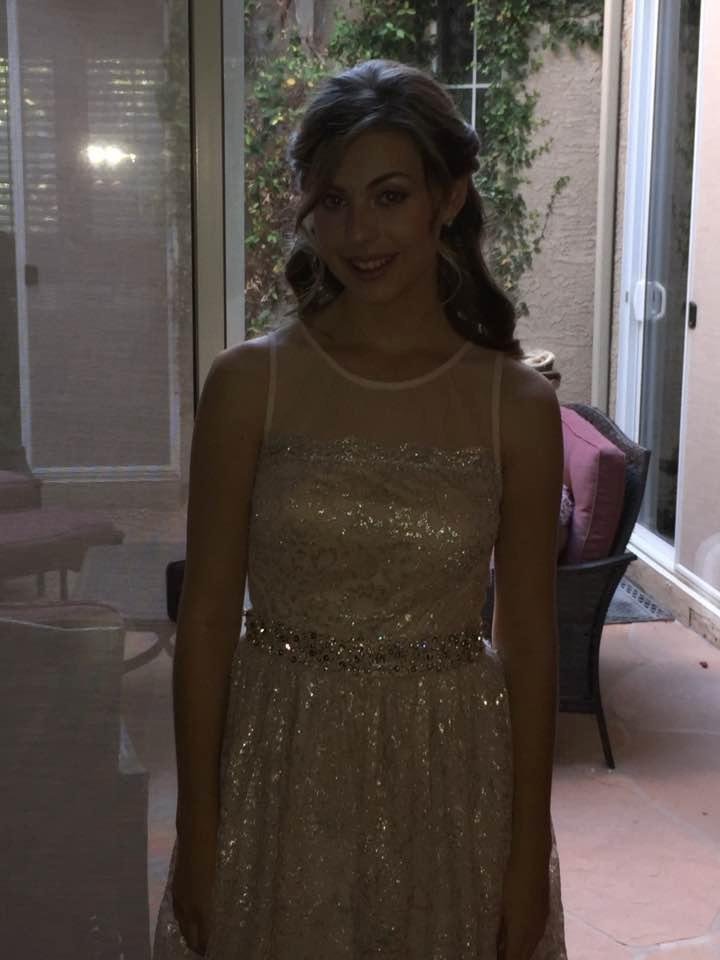 Gabby is off to meet her friends for the Seton Catholic Homecoming dance.
