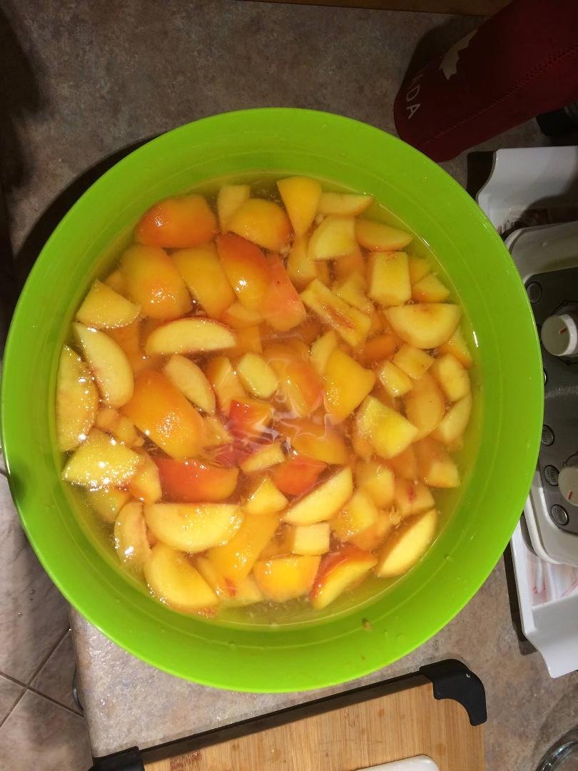 My peaches are blanched & ready to can . Yummy 😍