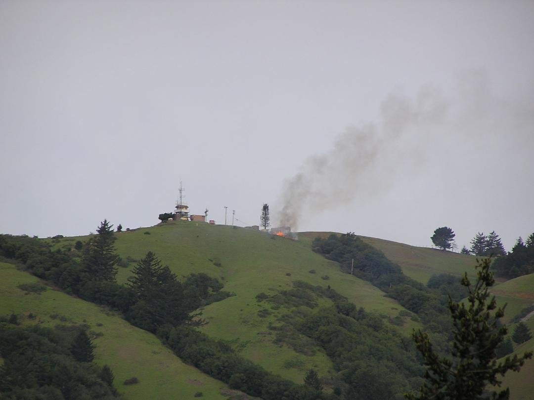 Fire on Mt. Barnabe. I wonder if anyone called this in to the fire department. Probably OK, that's the fire lookout on the left.