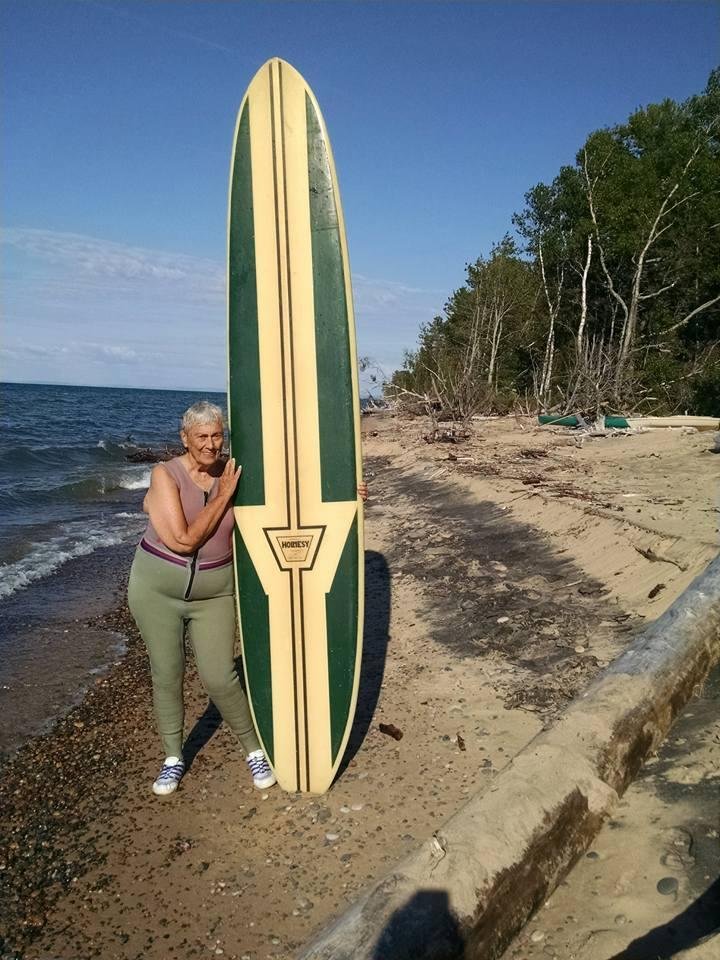 Granny's long board - grandkids visiting and Joan couldn't stand not playing in the water.
Don't know which was more fun - helping her into her 40 year old wetsuit or/ watching her try to crawl into the 50 year old long