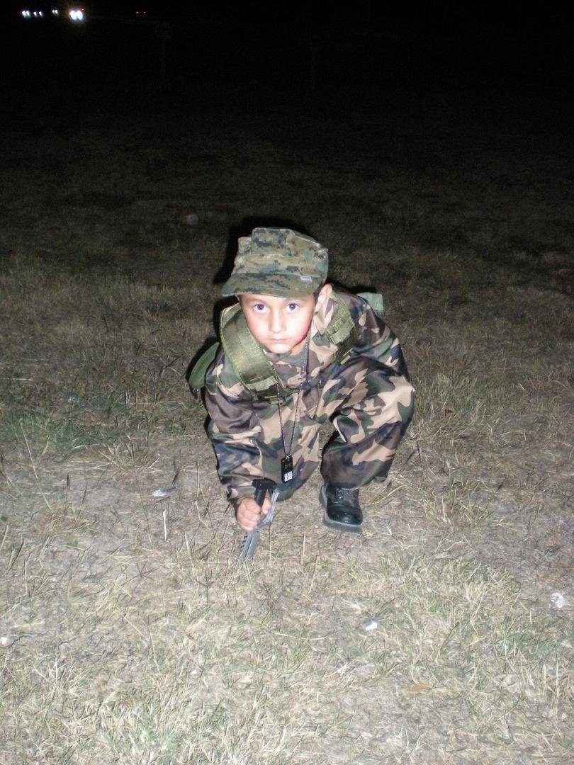 My Military ceremonial and inspection equipment is still in use. He is searching for land mine.