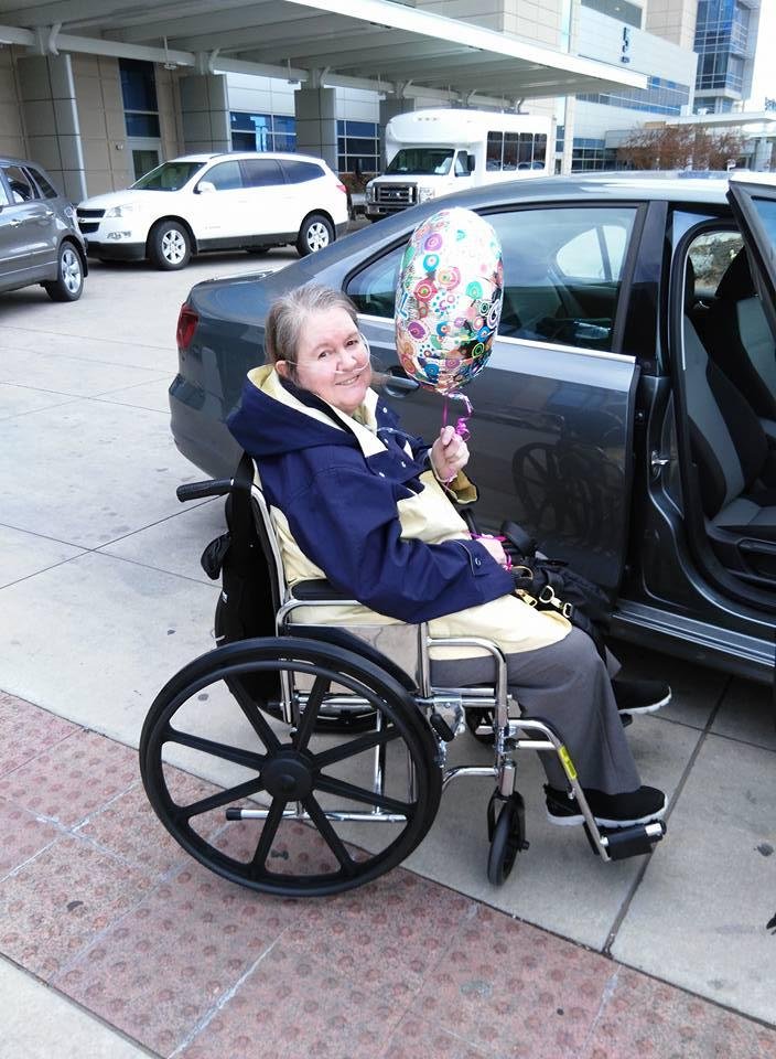 Shirley leaving the hospital.