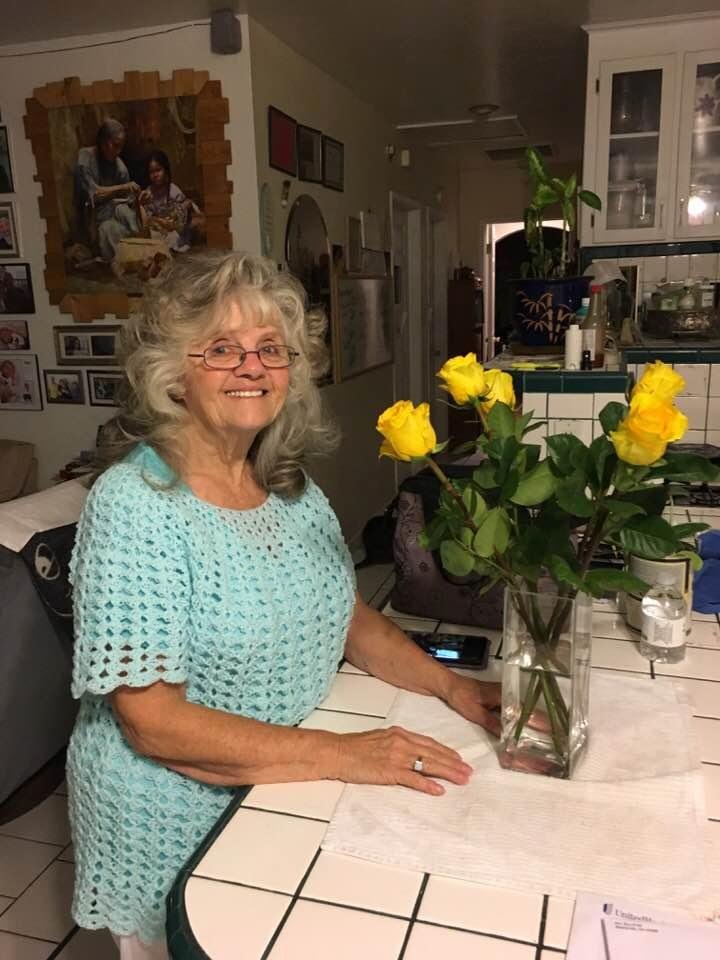 My beautiful friend Rita. That is a smile while she was hurting from a pain in her neck, but she made that beautiful sweater she has on ,