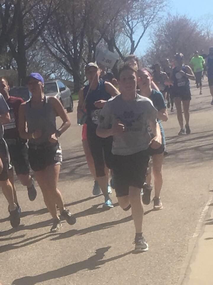 Running past Spirit Lutheran. Go Heather.