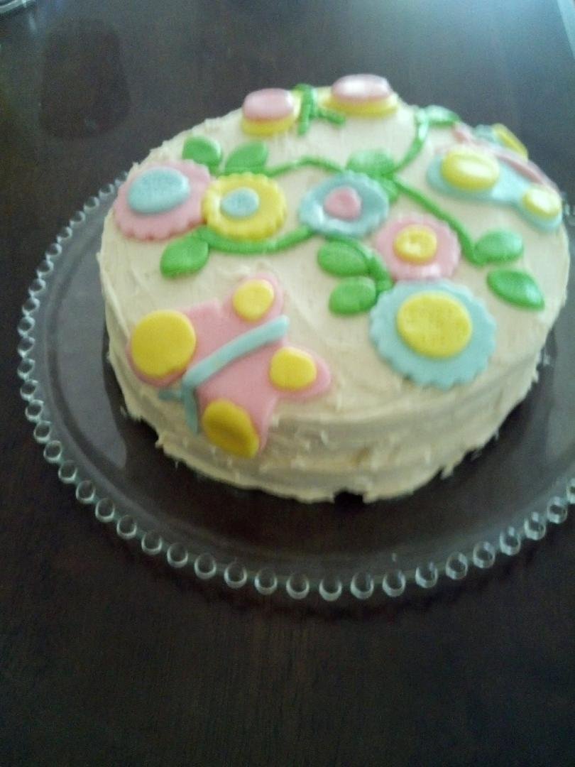 This is the cake that I made for tomorrow's Mother's Day dinner.  First time I ever used (and made) fondant.  It is really pretty easy to work with