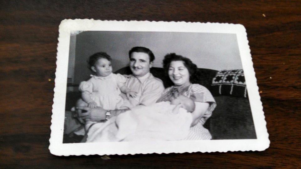 Here's me in my dad's arms and my brother Ben six months in moms. I miss them so much.